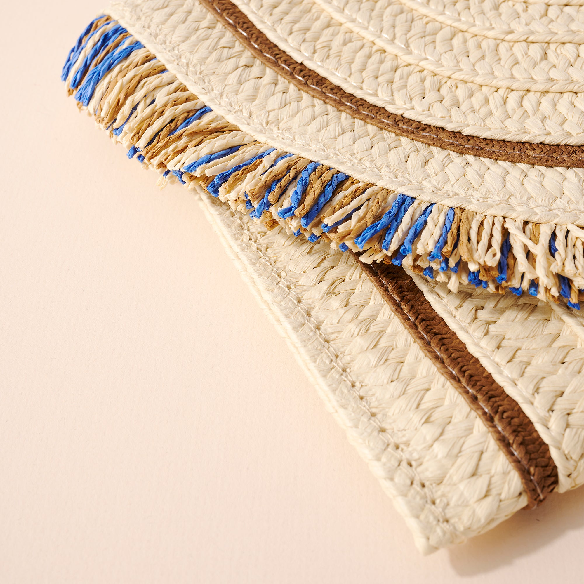 Braided raffia clutch bag